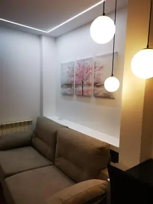 Zona de estar de Apartamentos El Pilar