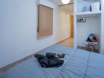 Cama o camas de una habitación en Apartamentos El Pilar