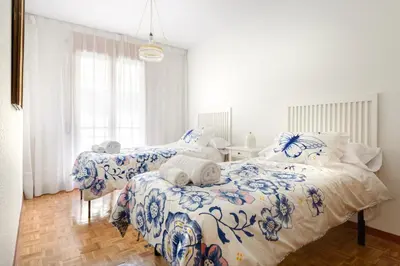 Cama o camas de una habitación en Alojamiento Turístico Calle Mayor Jaca