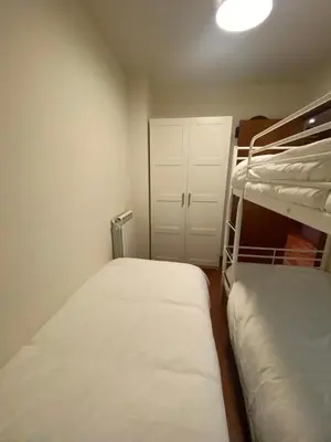 Cama o camas de una habitación en Bajo con terraza y vistas a las montaña en Formigal