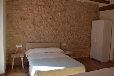 Cama o camas de una habitación en Apartaments Casa el Metge