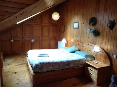 Cama o camas de una habitación en Apartamento dúplex acogedor con piscina en Rialp
