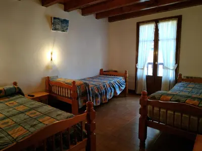 Cama o camas de una habitación en Pension Casat
