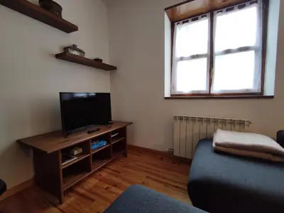 Una televisión o centro de entretenimiento en Inmocyma La terraceta de Linsoles-Valle de Benasque
