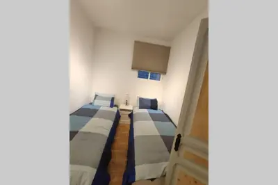 Cama o camas de una habitación en Precioso y acogedor piso en la Seu de Urgell