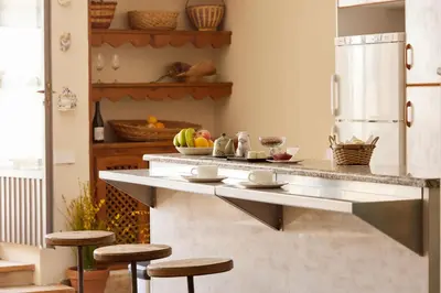 Una cocina o zona de cocina en Amplio apartamento rural con terraza