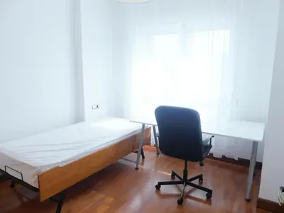 Cama o camas de una habitación en Apartamento luminoso, funcional y amplio en zona hospitalaria