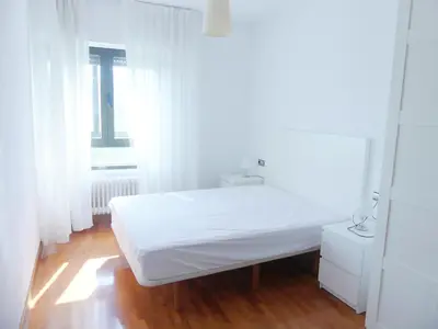 Cama o camas de una habitación en Apartamento luminoso, funcional y amplio en zona hospitalaria