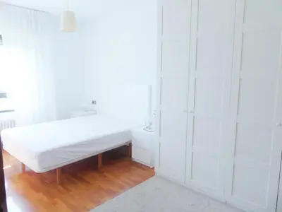 Cama o camas de una habitación en Apartamento luminoso, funcional y amplio en zona hospitalaria