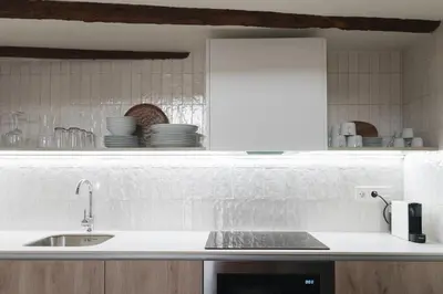 Una cocina o zona de cocina en Apartaments la Rambla - Licorella - 4 persones