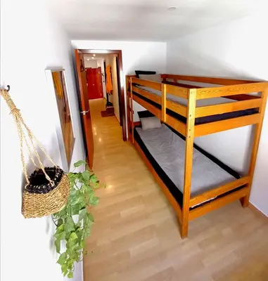 Cama o camas de una habitación en Cornu Karma Apartment Siuranella