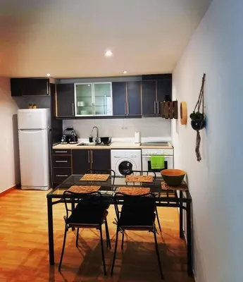 Una cocina o zona de cocina en Cornu Karma Apartment Siuranella
