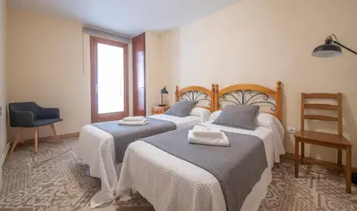 Cama o camas de una habitación en Cal Giral I