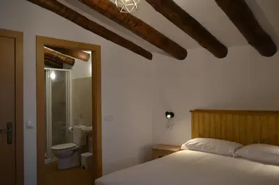 Cama o camas de una habitación en Rincón de Guara