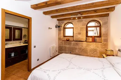Cama o camas de una habitación en Apartamento Duplex Puente de Piedra, en un enclave único y exclusivo