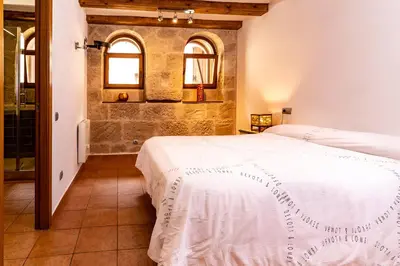 Cama o camas de una habitación en Apartamento Duplex Puente de Piedra, en un enclave único y exclusivo