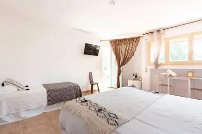 Cama o camas de una habitación en AldeaMia, Forest, mountain view, beach at 8 min