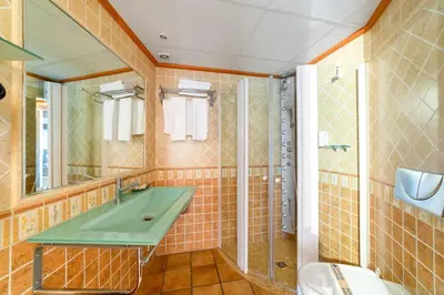 Un baño de HOTEL EL CASTELL