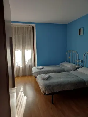 Cama o camas de una habitación en Albergue rural l'Almada de Yebra