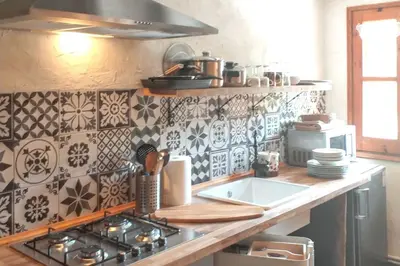 Una cocina o zona de cocina en Warm apartment in Ardanué with mountain view, 45 m²