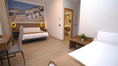 Cama o camas de una habitación en Encanto Tarazona