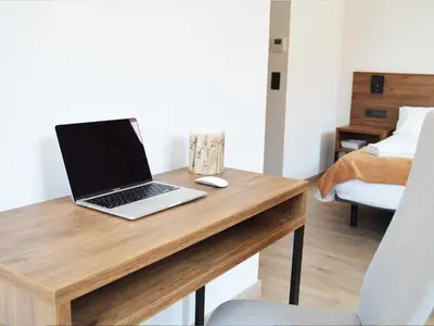 Una televisión o centro de entretenimiento en Encanto Tarazona