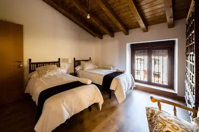 Cama o camas de una habitación en Casa Unzué Turismo Rural