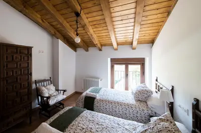 Cama o camas de una habitación en Casa Unzué Turismo Rural