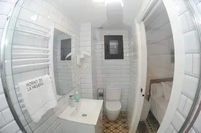 Un baño de Horno de la Higuera Alojamiento