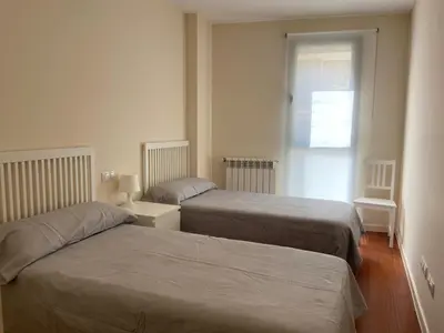 Cama o camas de una habitación en Apartamento Pirineos, Urb Las Margas Golf