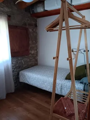 Cama o camas de una habitación en Ca La Martona