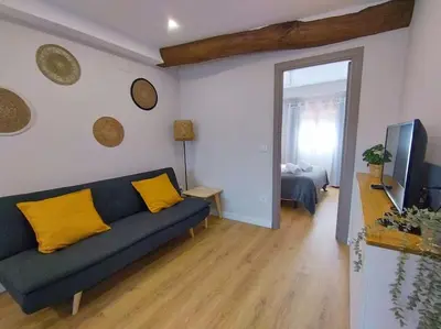 Una televisión o centro de entretenimiento en Casa Borlas