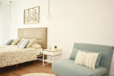 Cama o camas de una habitación en APARTAMENTO ABUELA PILAR