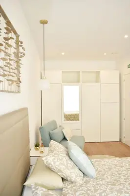 Cama o camas de una habitación en APARTAMENTO ABUELA PILAR