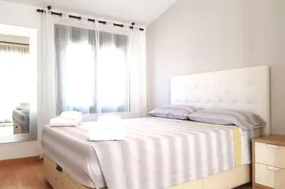 Cama o camas de una habitación en Ático en Monzón
