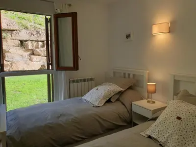 Cama o camas de una habitación en PIRINEOS 3