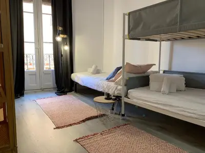 Cama o camas de una habitación en VTZ El Balcón a la Basílica V - vistas inmejorables a la Basílica del Pilar!