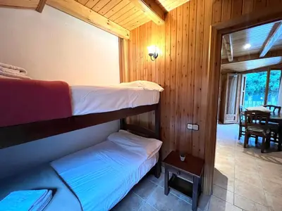 Cama o camas de una habitación en Apartament Àtic d'Espot - L'Amfitriona