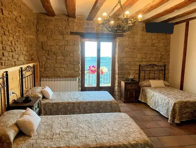 Cama o camas de una habitación en Casa Rural Las Migas