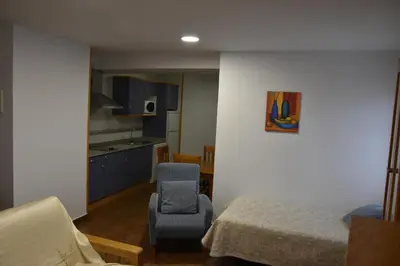 Cama o camas de una habitación en Aparthotel Tres Caminos