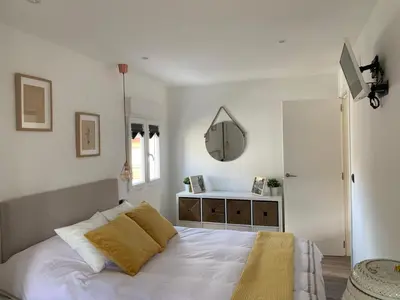 Cama o camas de una habitación en Loft con 2 habitaciones recién reformado.