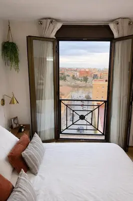 Cama o camas de una habitación en El Torreón del Pilar. Opción de parking