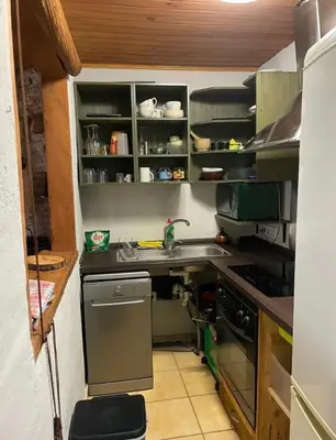 Una cocina o zona de cocina en cal perelló