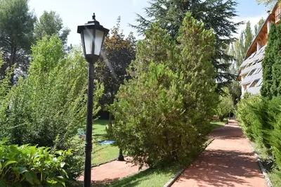 Jardín al aire libre en Acogedor apartamento con piscina compartida y opción a parking