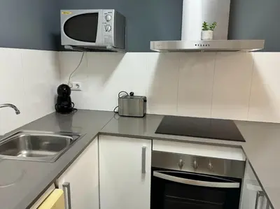 Una cocina o zona de cocina en APARTAMENTO ROMELIA bajo A