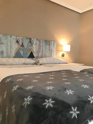 Cama o camas de una habitación en Apartamento Estiviellas, Pirineo