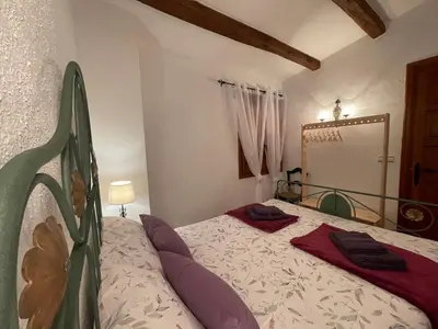 Cama o camas de una habitación en Masia Catalana SolSenyor by El Secret de la Conca