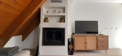 Una televisión o centro de entretenimiento en Apartamento centro de Sallent con WIFI
