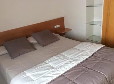 Cama o camas de una habitación en Hotel Viaurelia