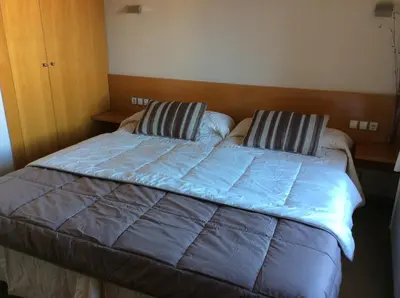 Cama o camas de una habitación en Hotel Viaurelia